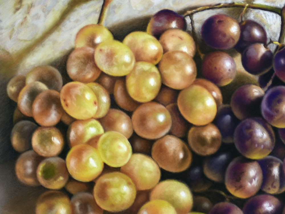 Sandro Bastioli. Hyperrealistic pastel painting: bunch of grapes illuminated by the sun on a mineral base. Extraordinary transparency of the grapes. Detail 1